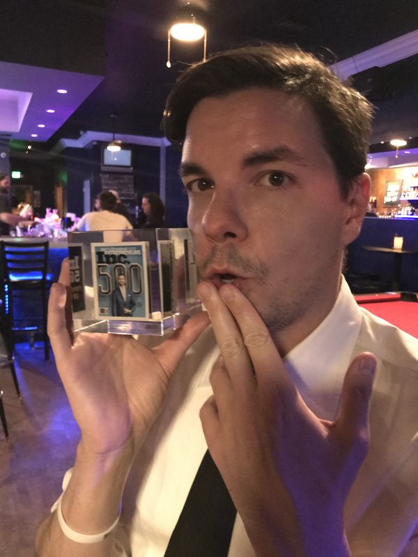 Corey with Inc 500 award